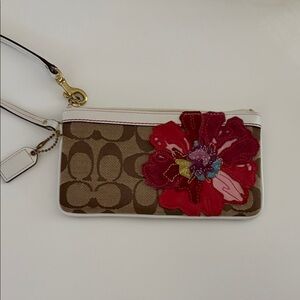 Coach Poppy Wristlet with Vibrant Red Floral Design